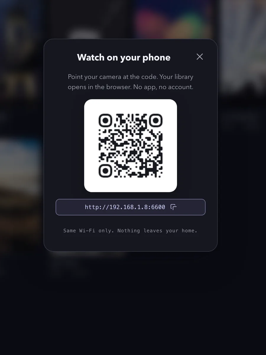 The Reelloft desktop app with the Watch on your phone dialog open: a QR code and the library address on your Wi‑Fi.
